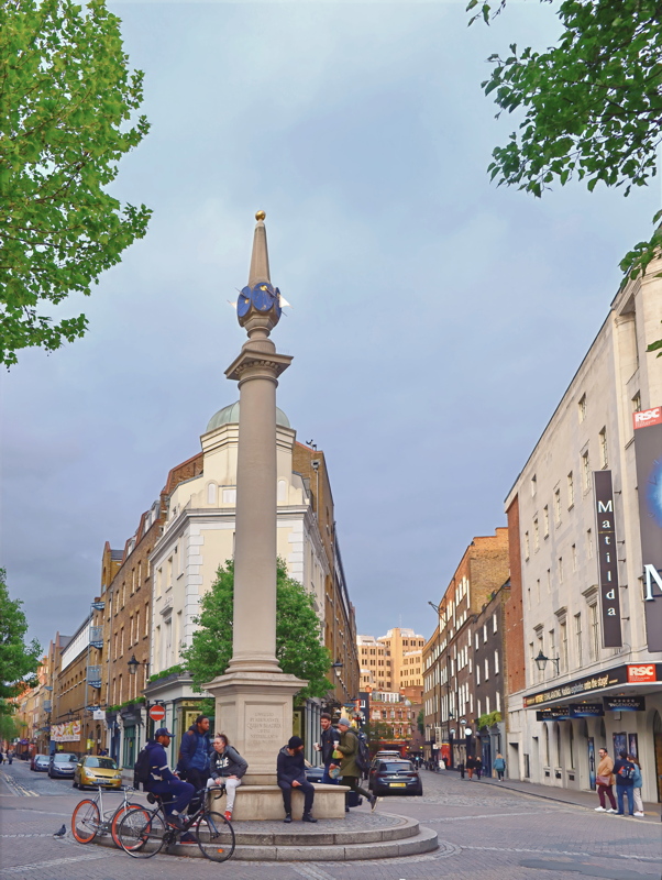 8 - The famous Seven Dials monument and sundial pillar located in the Covent Garden district of central London, England